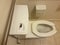 flush lever on side of toilet sign in bathroom or restroom