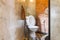 Flush Toilet in Country Loft Interior Design Room