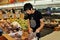 Flushing, NY:Youth Sorting Grapes at Supermarket