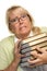 Flustered Attractive Woman with Stack of Books