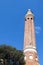 Fluted Minaret Mosque - famous symbol and landmark of Antalya, Turkey against blue spring sky