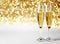 flutes with champagne or fizzy white wine on black background with blurred sparkles in the back