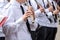 Flutist and group of clarinet players in the military orchestra