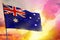 Fluttering Australia flag on beautiful colorful sunset or sunrise background. Success concept