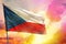 Fluttering Czechia flag on beautiful colorful sunset or sunrise background. Success concept
