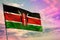 Fluttering Kenya flag on colorful cloudy sky background. Prosperity concept