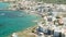 Fly Away From Hersonissos, Aerial View On Blue Sea, Boats And Town Houses