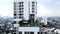 Fly Away Towards Infinity Pool On The Hotel Rooftop In Bangkok, Thailand. Aerial Pullback Shot