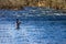 Fly Fisherman Casting an Artificial Fly for a Trout in Roanoke River, Virginia, USA