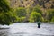 Fly Fisherman Casting on the Deschutes River