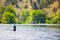 Fly Fisherman Casting on the Deschutes River