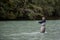 A Fly Fisherman casts his line for a fish on the Squamish River