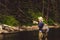 A fly fisherman fishing for trout on the mountain river in Northern Idaho