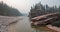 Fly fishing on the Flathead River in the Bob Marshall wilderness area during the 2017 fall fires in Montana USA