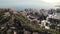 Fly over Castillo de Gibralfaro fortress and reveal of Plaza de Toros La Malagueta bullring, Malaga, Spain