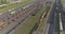 Fly over a large railway junction. Freight trains stand at the railway junction top view