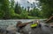 Fly Rod and Net by the River