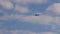 Fly small civil aircraft in sky. Double seat plane flies forward in cloudy sky. agricultural air vehicle carrying