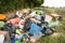 Fly tipping of household waste in a country lane. Hertfordshire. UK