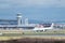 A Flybe Embraer E190 plane taxis after landing at London Gatwick Airport