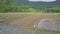 Flycam Moves across Flooded Rice Fields Plots and Dry