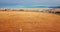 Flying above and aerial view of a field with hay stacks. Rural scene. Russia