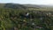 Flying above countryside village houses. Aerial drone view, Bikfalva, Bicfalau, Szeklerland, Romania