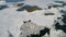 Flying above ice, top aerial view of arctic ice floes