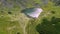 Flying above Iezer glacial lake, Rodnei mountains, Carpathians, Romania