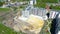 Flying above industrial railroad station with cargo trains and freight containers. Railroads and shipping container trains