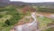 Flying above Strokkur geysir in Iceland, aerial high angle drone view