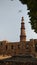 Flying aeroplane over the qutub minar in India