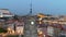 Flying around clock tower in historic centre of Porto