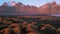 Flying backward at Vestrahorn mountain at sunset, Stokksnes, Iceland aerial view from drone