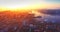 Flying backwards above Vladivostok city residential area. Sunrise. Russia