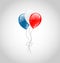 Flying balloons in american flag colors