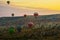 Flying on the balloons early morning in Cappadocia. Colorful sunrise in valley, Goreme village location, Turkey, Asia. Artistic