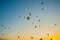 Flying on the balloons early morning in Cappadocia. Colorful sunrise in valley, Goreme village location, Turkey, Asia. Artistic