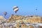 Flying balloons over mountains at sunset. Capadocia. Turkey.