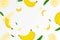 Flying Banana background, seamless pattern with defocused blur effect. Falling Ripe banana and palm leaves isolated. Can be used