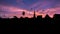 Flying birds and Silhouettes Sunset on the Temple