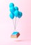 Flying books with balloons on pink background