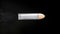 Flying bullet isolated on black background with alpha channel 4K