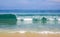 Flying butterfly over a high wave at Karon Beach in Phuket in Thailand