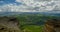 Flying clouds over the mountain canyon