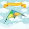 Flying colorful kite in the sky with clouds isolated on background. Summer festival, holiday, vacation time. Kitesurfing concept.