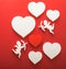 Flying cupid silhouette with hearts, happy Valentine`s Day banners, paper art style. Amour on red paper