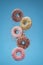 Flying donuts with colorful background