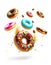 Flying donuts on white background, created with generative AI