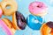 Flying doughnuts on blue